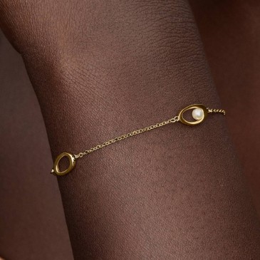BRACCIALE LINEA SINUOSA E PERLA IN ACQUA DOLCE COLTIVATA