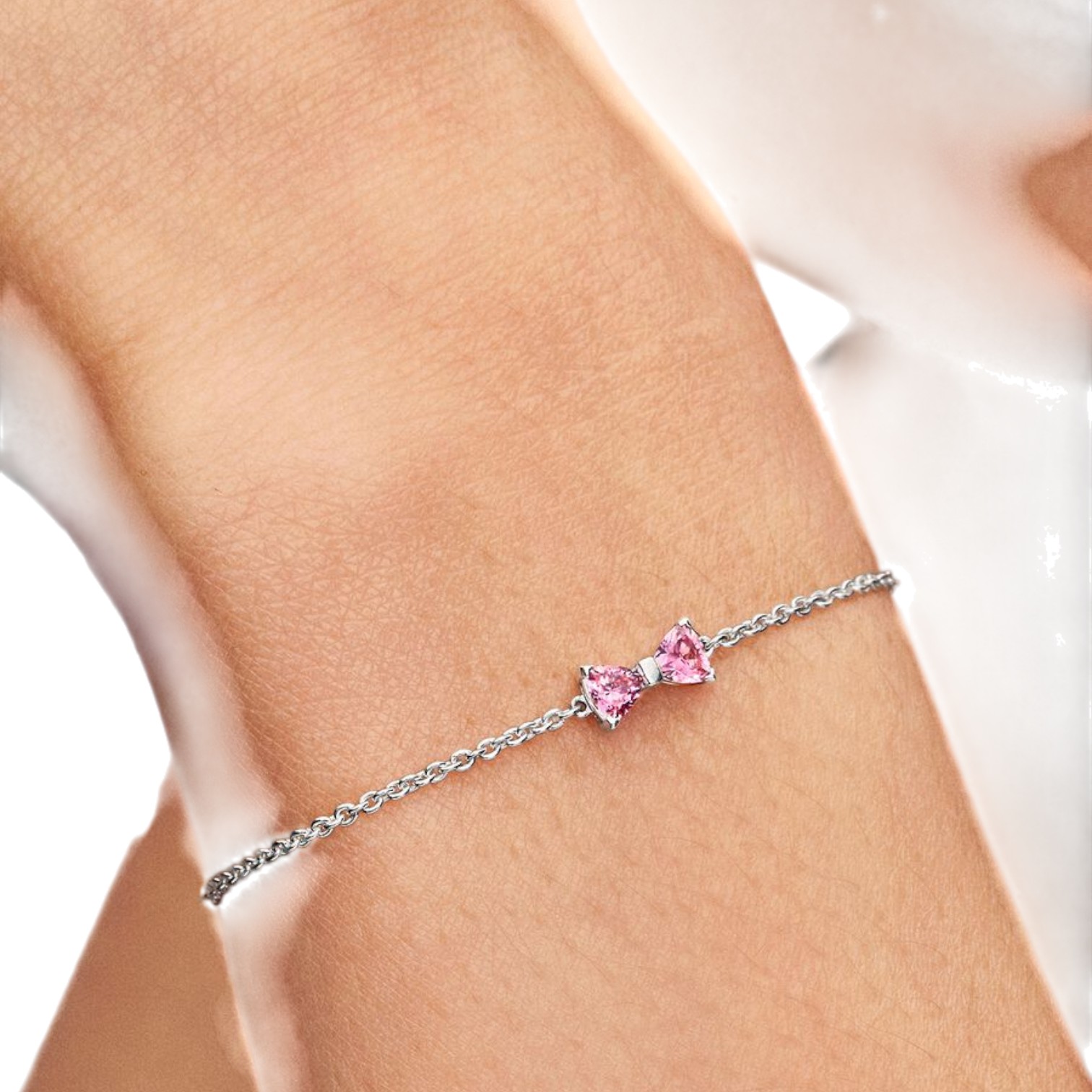 BRACCIALE FIOCCO LUMINOSO ROSA